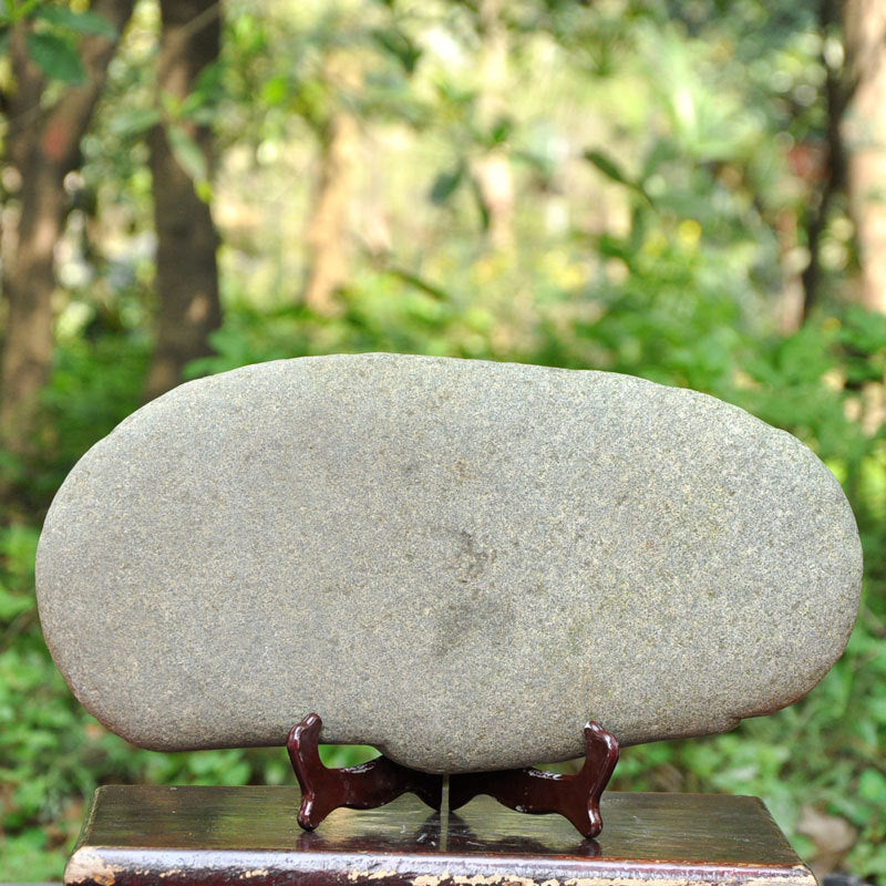 Natural flattened gray stone