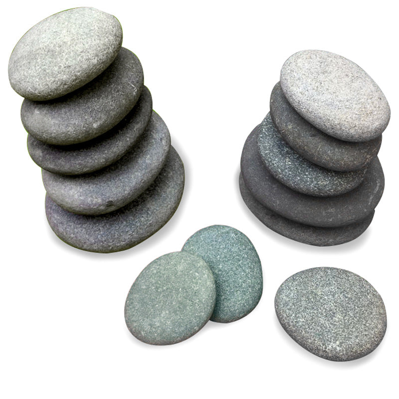 Natural flattened gray pebble